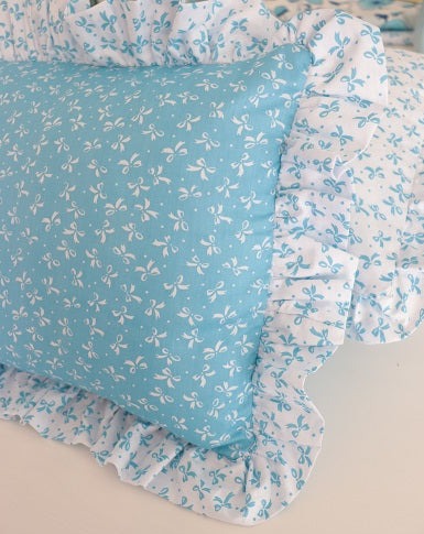 Blue Bow knot cushion cover with contrasting frilly trim