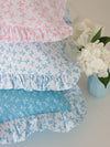 blue bow knot cushion cover with contrasting frilly trim