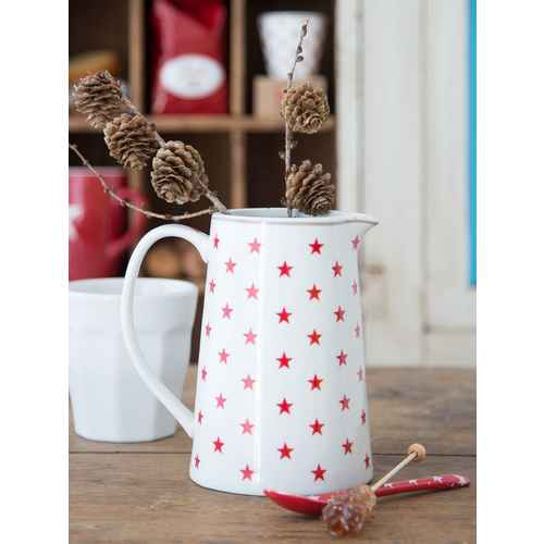 white jug with red stars